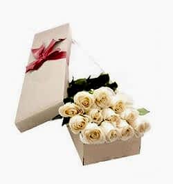 send 12 white roses full box arrangement to dhaka, bangladesh