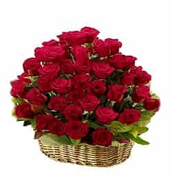 send ​100 red roses in a basket arrangement to dhaka, bangladesh