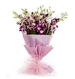 Send 12 Pcs. Pink Orchid in a Bouquet to Bangladesh